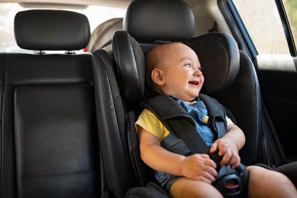toddler sitting in car during road trip 7FLYPXZ 1024x683 2