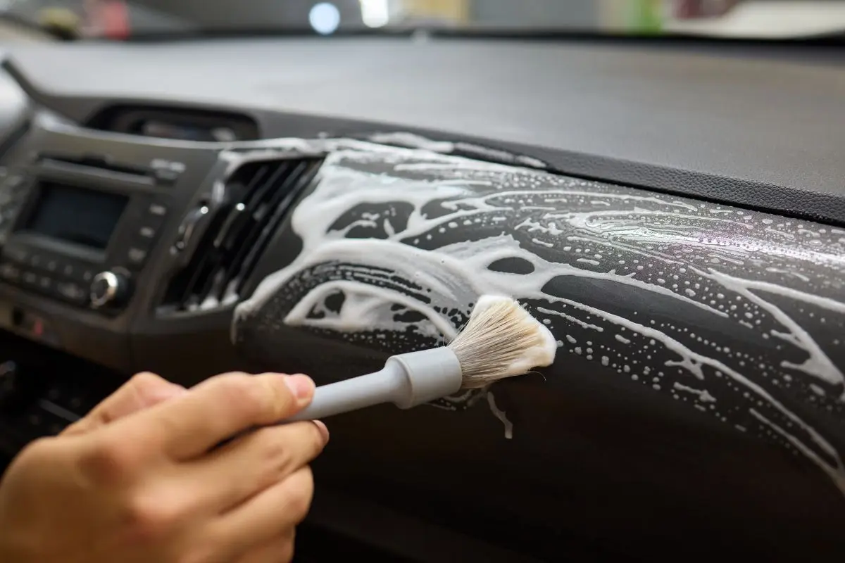 car interior cleaning process underway with brush detailed professional detailing 1
